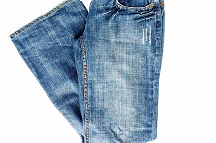 Beautiful casual jeans pants and clothes isolated on white backg, a Beauty & Fashion Photo by TanaCh