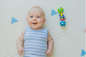Adorable baby playing with colorful, a Person Photo by Elizaveta Galitskaya