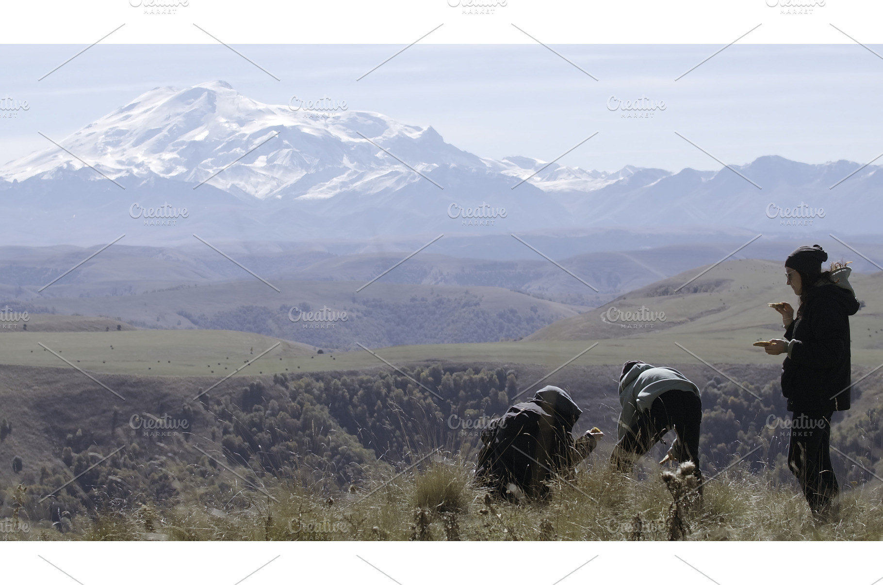 Hikers relax with view of autumn, a Nature Photo by Media Whale Stock
