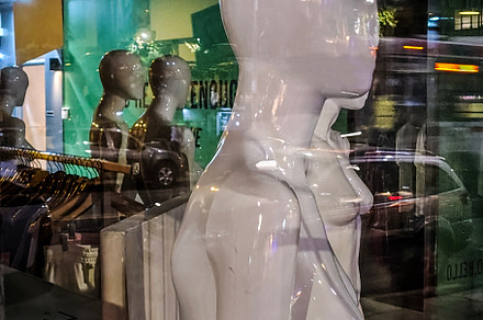 Store mannequin with urban reflections on glass, an Arts & Entertainment Photo by DanFLCreativo