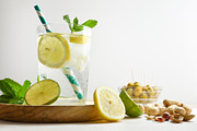 Refreshing carbonated lemon drink on table with white isolated b, a Food & Drink Photo by Davizro's Market (Thumbnail 2 of 2)