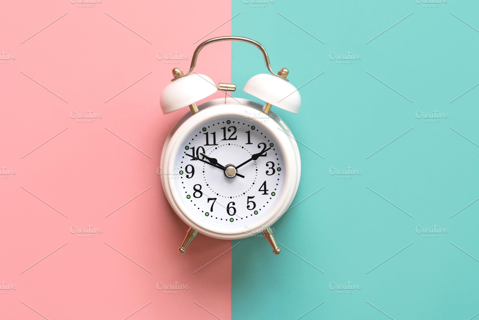 Top view of white alarm clock, an Abstract Photo by esthermm