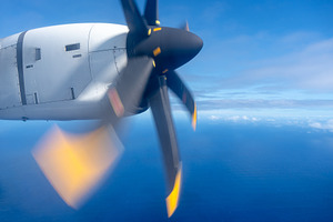 Aerial view of the Pacific Ocean with a spinning propeller, a Photo by GoodGoods