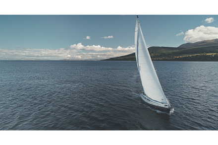 Seascape with luxury sailboat aerial, a Transportation Photo by Goinyk
