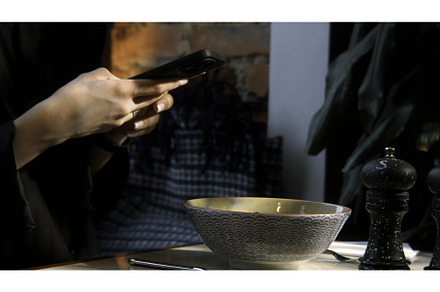 Side view of woman hands making, a Food & Drink Photo by Media Whale Stock