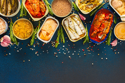 Different open tin cans, a Food & Drink Photo by Pandateam