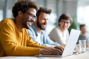 Smiling diverse team working, a Business Photo by MistyDay