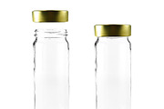 Clear Glass Jar with Gold Metal Lid, a Packaging Mockup by Professional Assets (Thumbnail 1 of 5)