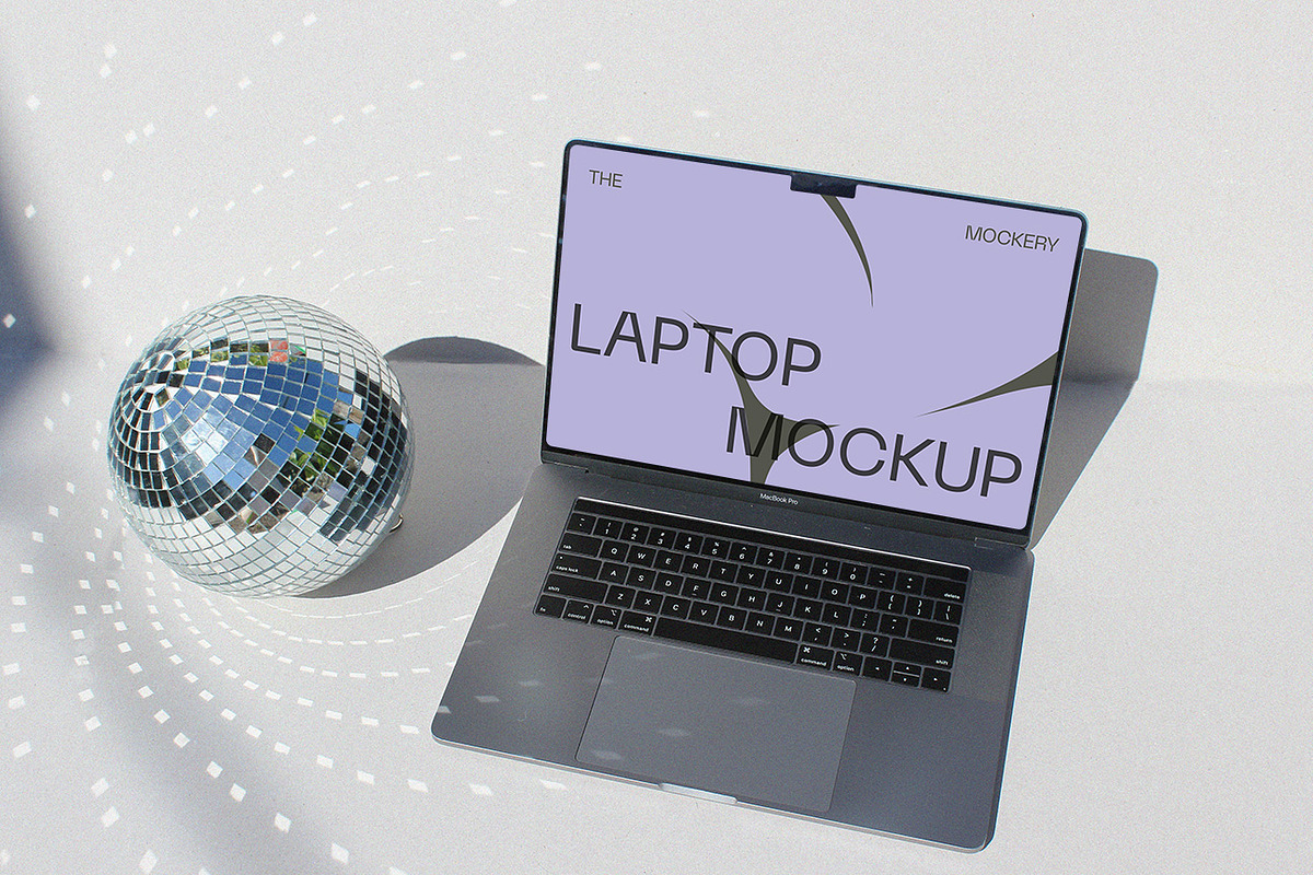 Laptop Mockup Disco Film Filter, a Mockup by TheMockeryShop
