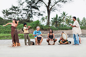 Hippies playing music, a Photo by saiko3p