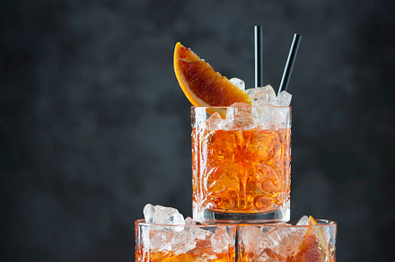 Italian traditional cocktail Aperol Spritz with orange, a Food & Drink Photo by oxana.denezhkina