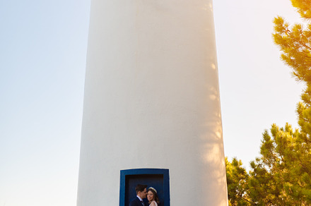 Just married couple on the door of a lighthouse, a Person Photo by rubenchase