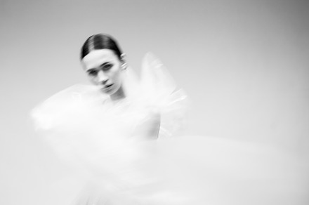 Black and white blurred portrait of containing vogue, fashion, and plastic