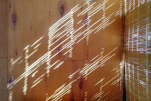 Cozy rustic wooden room with sunlight pattern, an Architecture Photo by DanFLCreativo