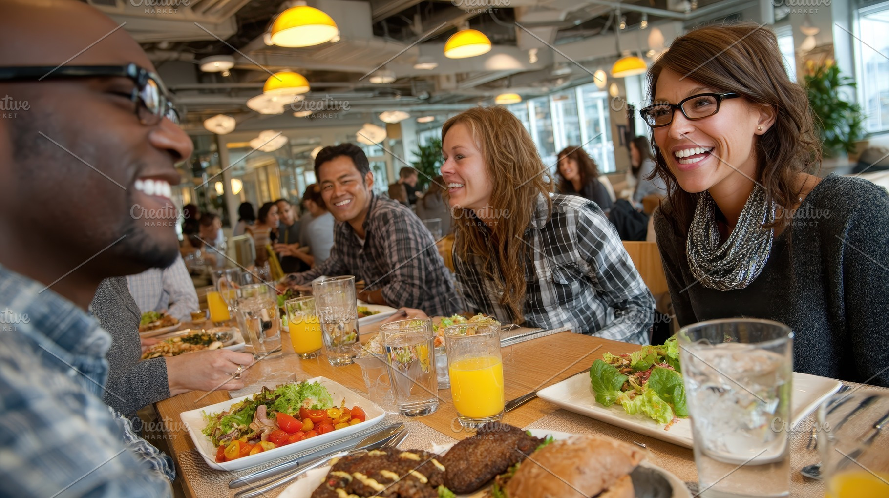 Friends enjoying a delicious meal to, a Photo by Pixeness Studio