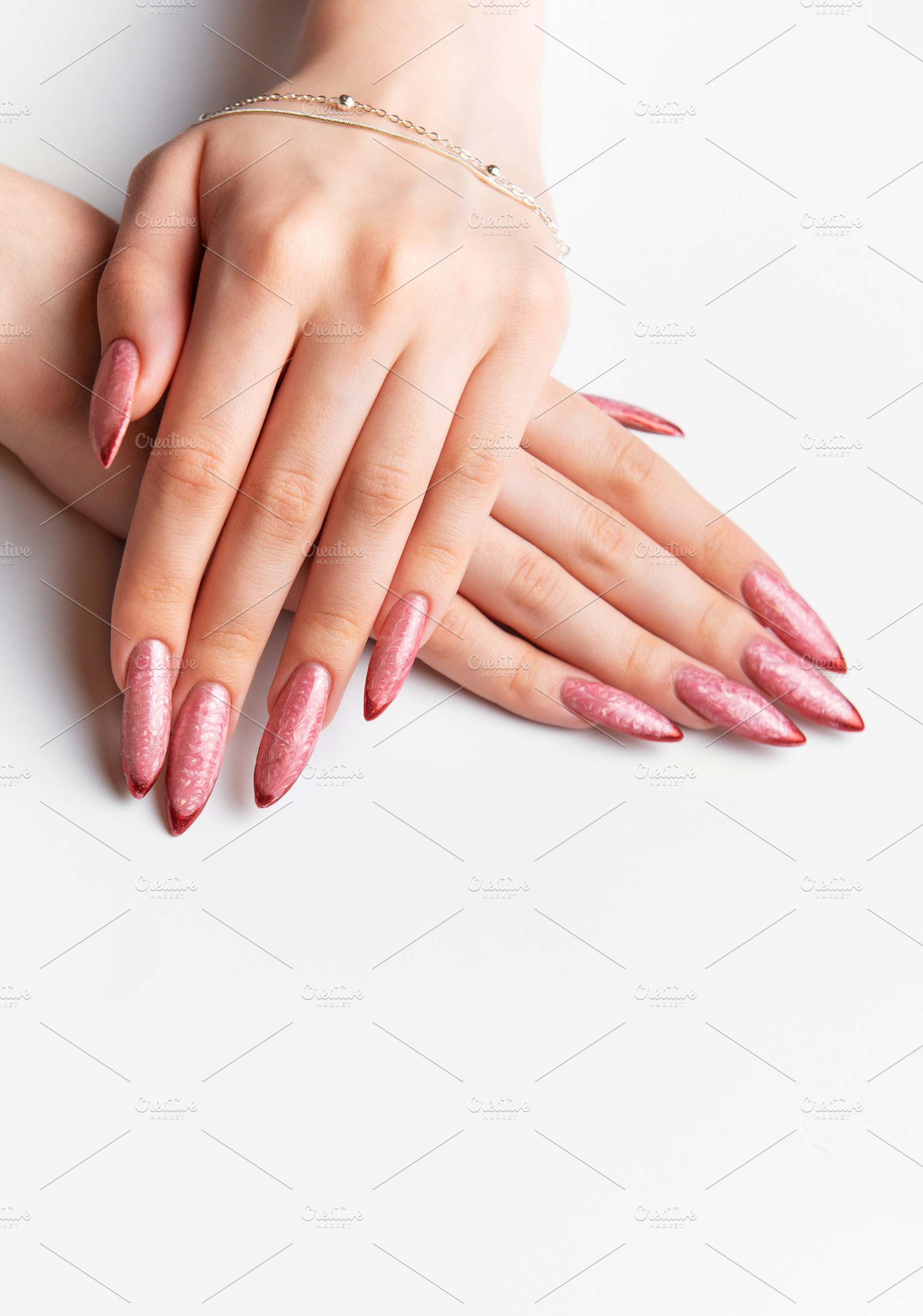 Woman's hands showing long pink glitter fingernails manicure wit, a Beauty & Fashion Photo by Olena Rudo