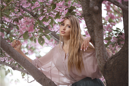 Woman at Blossoming Sakura Tree on, a Beauty & Fashion Photo by Emotion photo