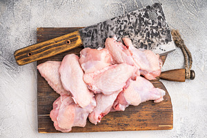 Fresh chicken wings, showcasing their natural texture, perfect f, a Food & Drink Photo by composter-box@mail.ru