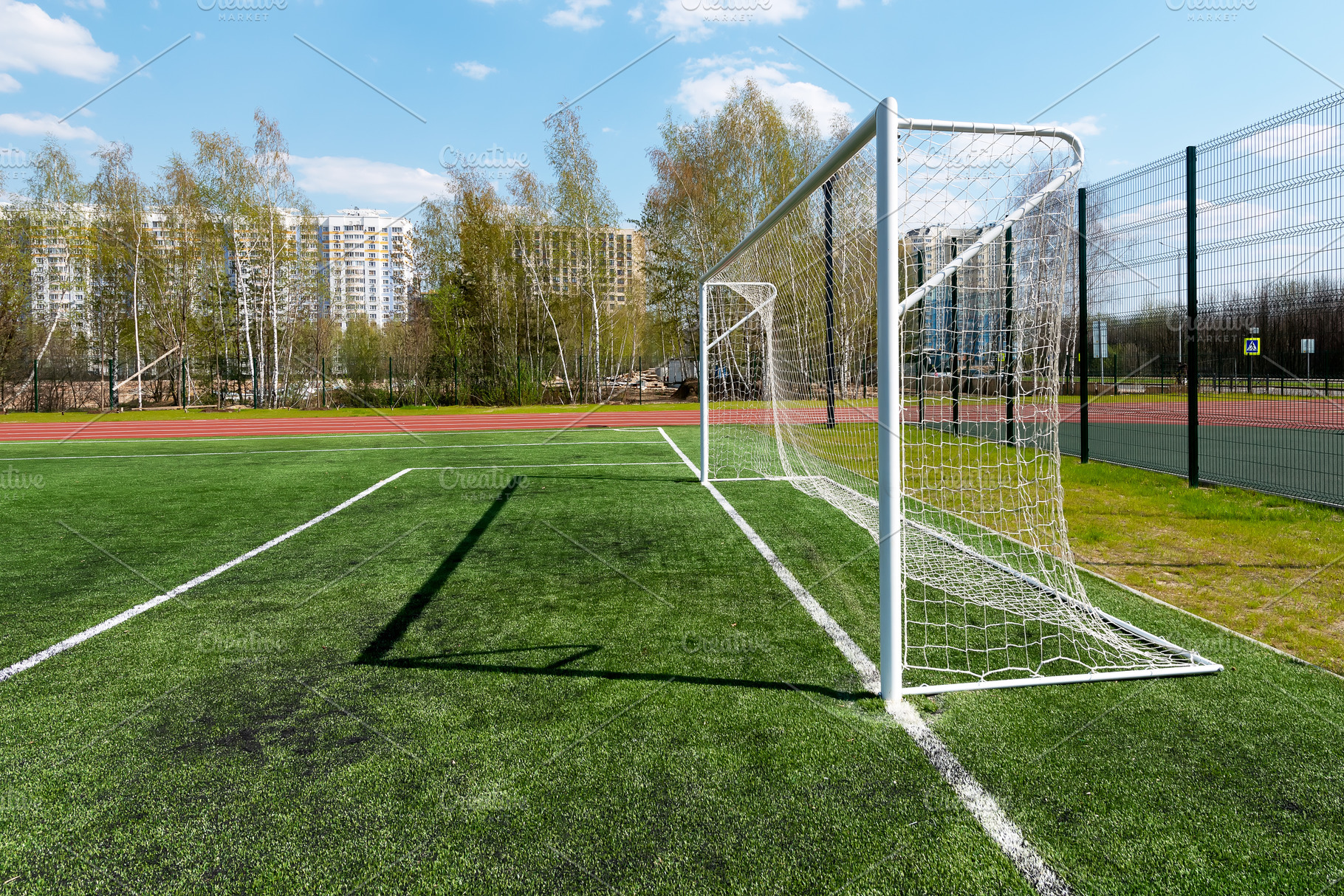 Football goal on a school field, a Sports & Recreation Photo by FedotovAnatoly