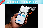 Smartphone Held In One Hand Dark PSD, a Device Mockup by Bruno's Shop (Thumbnail 1 of 3)