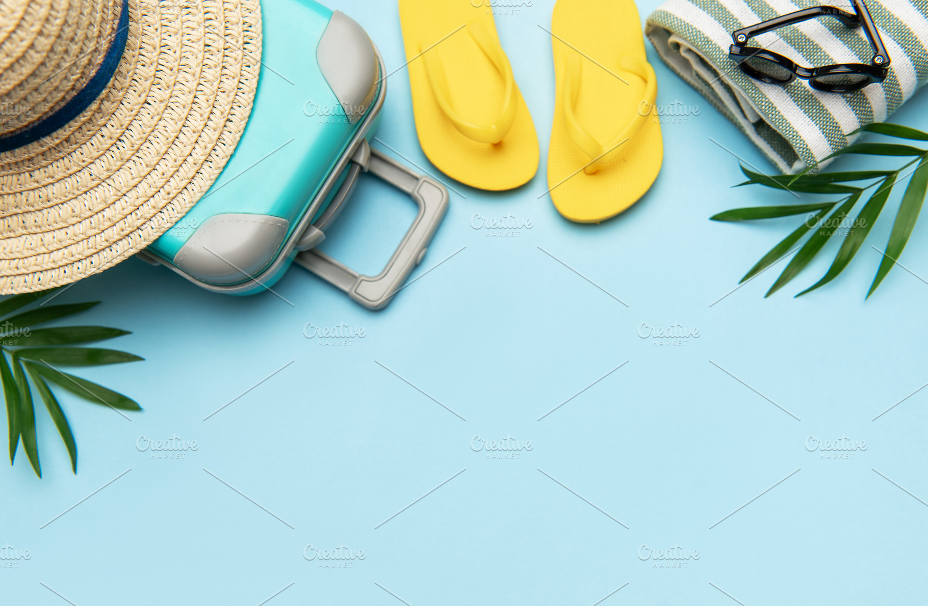 Suitcase, beach towel, flip flops, sunglasses and a straw hat su, a Holiday Photo by Olena Rudo