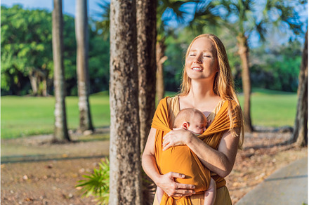 Mother holding her little baby in a