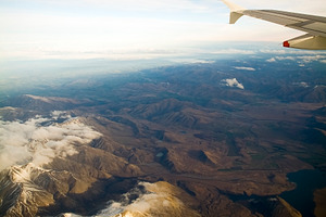 Flying Above Mountains at Sunset, a Nature Photo by THP Creative