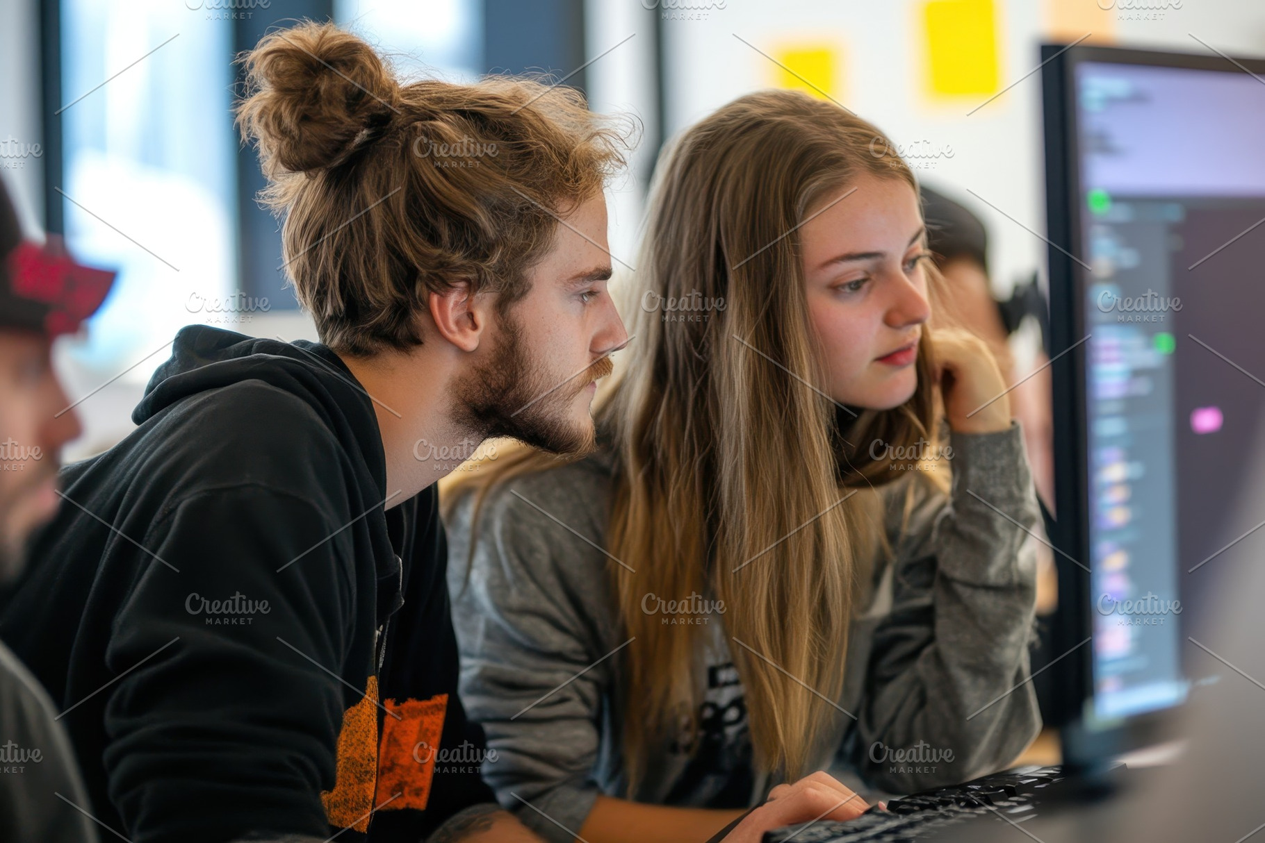 Young game designers collaborate on, a Photo by Iftikhar Alam