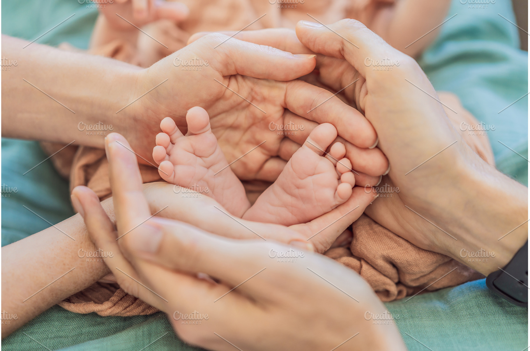 Newborn tiny feet surrounded by, a Person Photo by Elizaveta Galitskaya