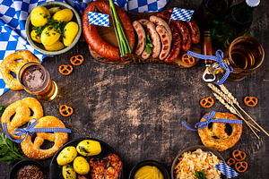Oktoberfest beer, pretzel, sausages, a Food & Drink Photo by Yulia Furman