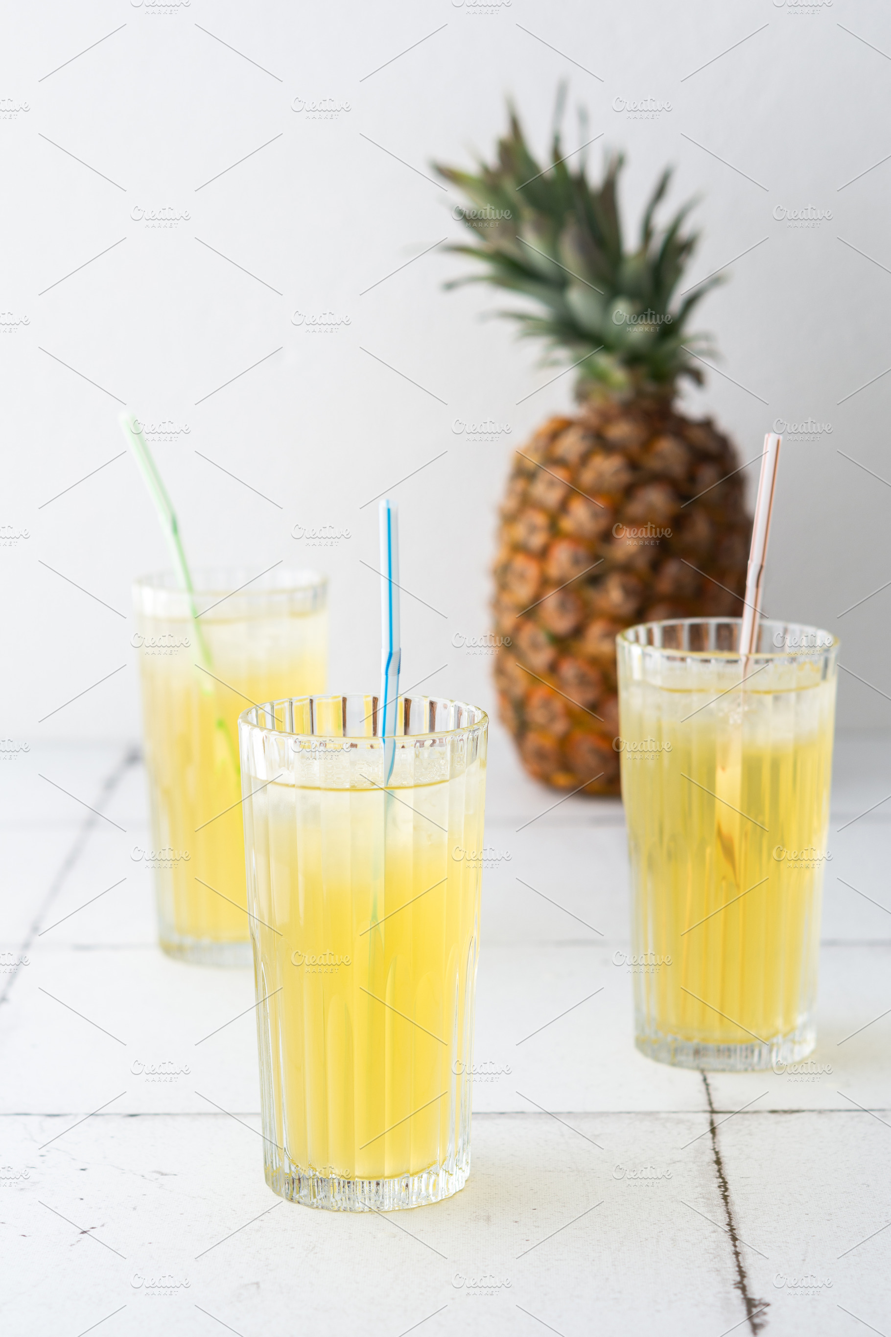 Pineapple juice in glasses, a Food & Drink Photo by Pundateam
