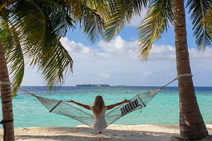 Bungalow in the Maldives, a Person Photo by Photostock