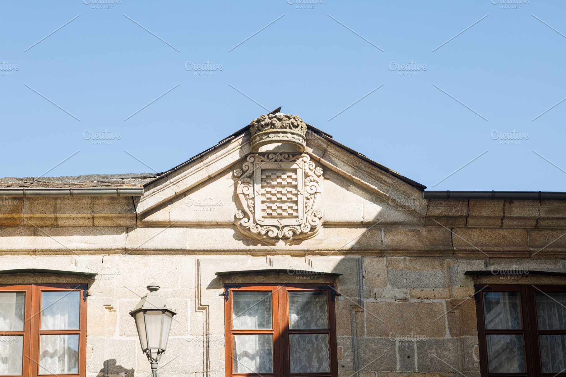 Historic Stone Building Facade with Ornate Coat of Arms, Lugo, S, an Architecture Photo by Bepslabor