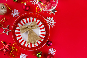 Christmas, New Year table setting with plate and Xmas ornaments