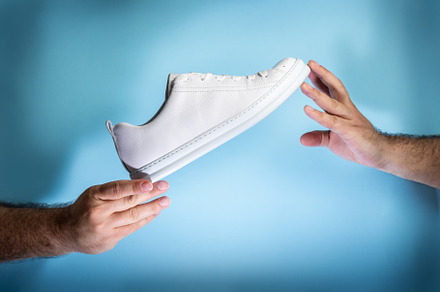 Stylish white Sneakers, a Photo by wr7 Media