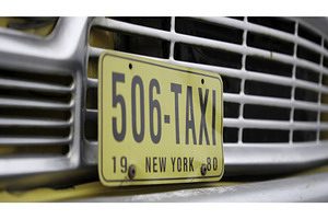 Yellow cab license plate from 1980, a Transportation Photo by Media Whale Stock