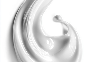 White creamy cosmetic product swatch forming an elegant swirl. P, a Photo by Studio ANNA