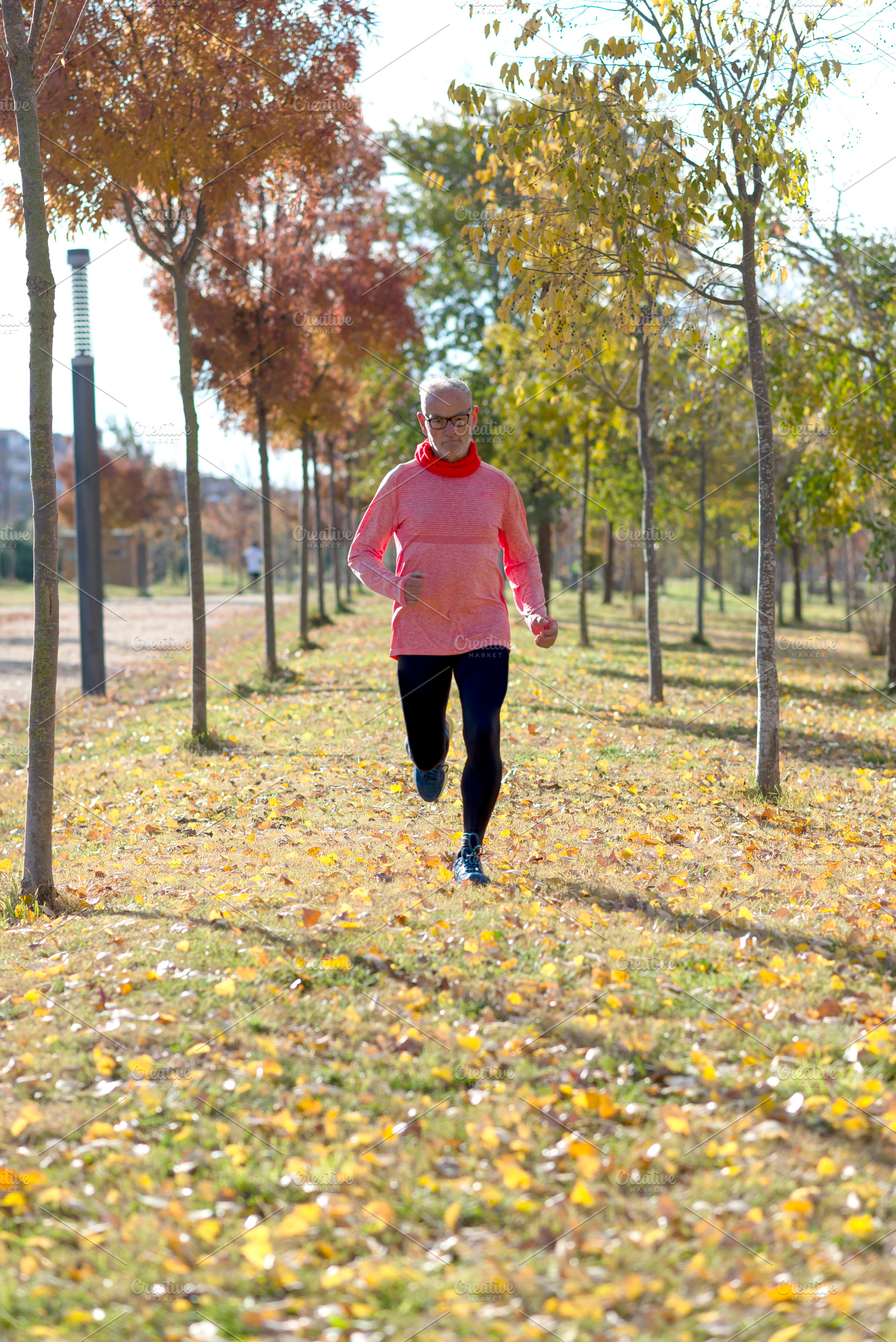 Senior man running outdoors in sportswear, a Sports & Recreation Photo by RF Images