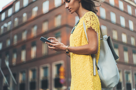 Young hipster girl with smartphone, a Person Photo by ImYanis
