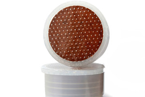 Two coffee pods balancing on white background, a Food & Drink Photo by Antonio Gravante Market