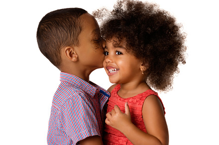 Two africanamerican siblings featuring portrait, kiss, and afro