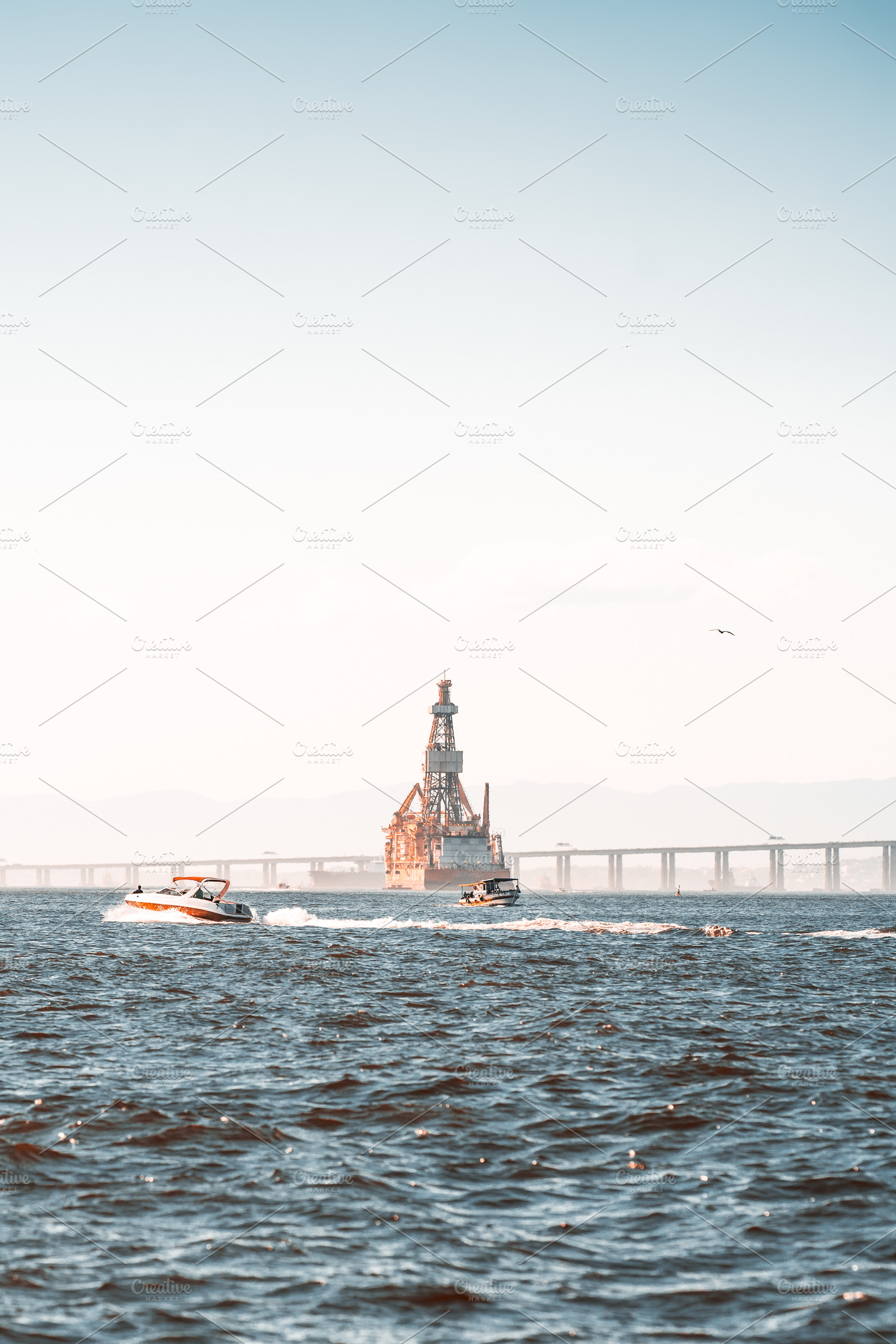 Speedboats Pass Offshore Drillship, a Sports & Recreation Photo by SkyNext