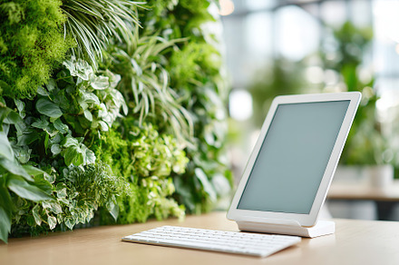 Modern desktop setup with wireless keyboard in a green indoor environment for p, a Technology Photo by AlyaAnd