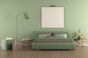 Green elegant bedroom with double bed