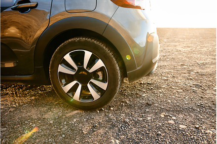 Car on the road in sunlight, a Transportation Photo by Gladkov photography