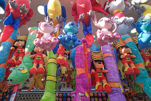 Plush toy booth at fair with bright characters, an Arts & Entertainment Photo by DanFLCreativo