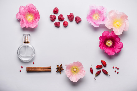 Bottle of perfume and fragrance ingr containing flowers, perfume, and natural, a Beauty & Fashion Photo by colnihko