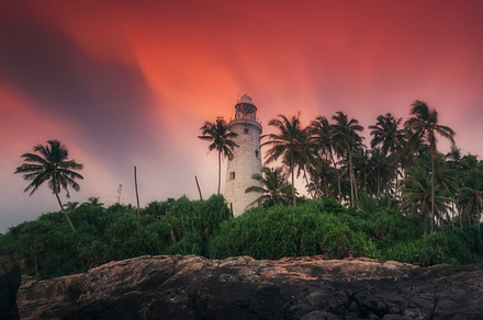 Lighthouse at sunset beruwala stock photo containing lanka and bentota