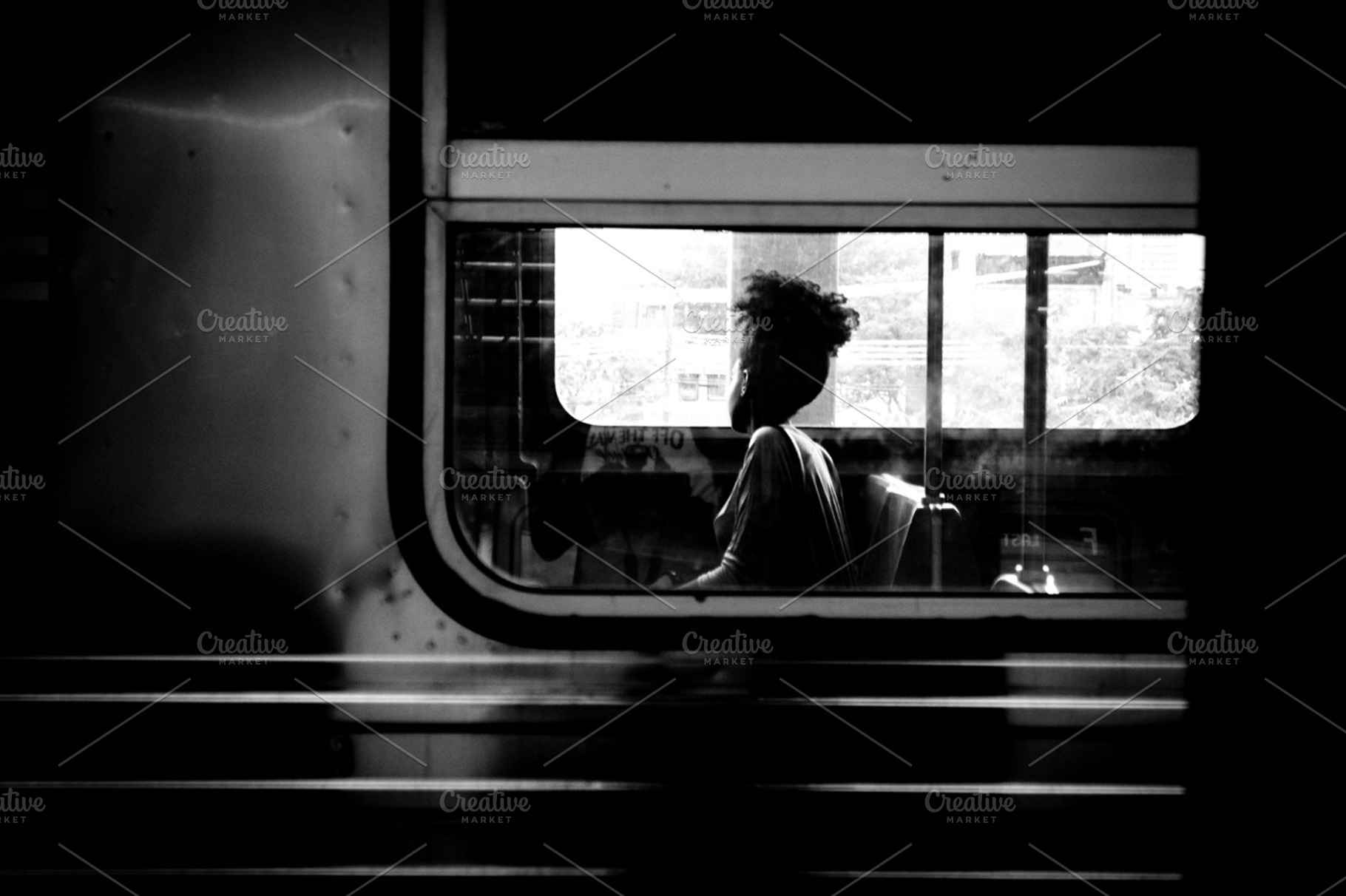 T r a i n containing building, city, and ny, a Person Photo by MARCONOISEY