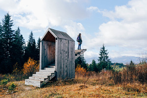 Girl on stairs in the mountains